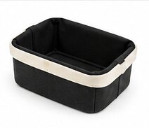 A black fabric storage basket with a cream trim