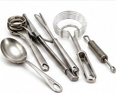 A set of stainless steel measuring spoons and rings
