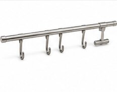 A stainless steel rail with five hooks