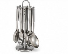 A stainless steel kitchen utensil set hanging on a stand